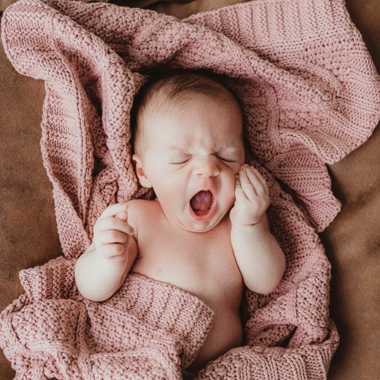 Pink knitted blanket hotsell