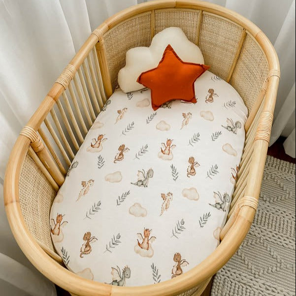 Rattan bassinet made up with the Mystique Bassinet Sheet / Change Pad Cover
