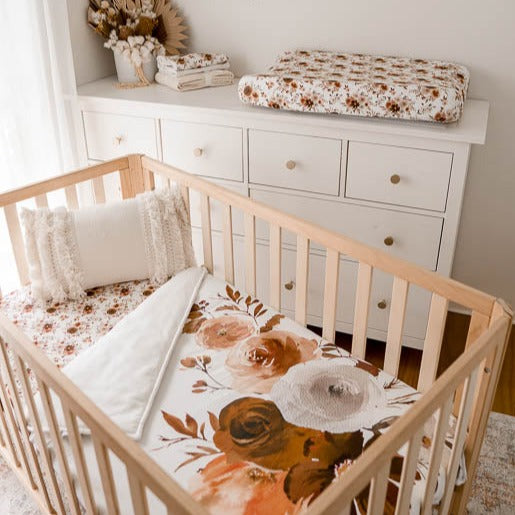 Full willow Nursery set including crib quilt, fitted sheet, bassinet sheet and wash cloth all presented in a babies nursery.